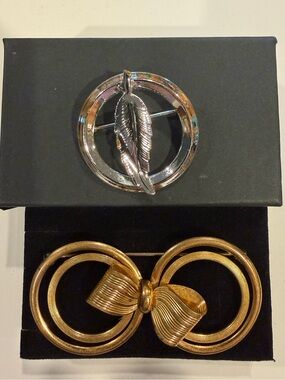 Gold-Tone Double Circle Bow Brooch and Silver-Tone Feather Brooch